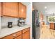 Bright kitchen features modern stainless steel appliances and ample counter space for convenient meal preparation and coffee at 13445 Kearney St, Thornton, CO 80602