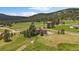 Beautiful aerial view showing home surrounded by nature at 7082 Silverhorn Dr, Evergreen, CO 80439