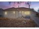 Charming single-story home with a well-manicured front yard and detached garage at 1010 S Newton St, Denver, CO 80219