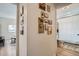 Hallway leading to the bathroom decorated with a gallery wall at 1010 S Newton St, Denver, CO 80219