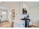 Modern kitchen with white cabinets, stainless steel appliances, and a clean, functional design at 1010 S Newton St, Denver, CO 80219