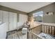 Cozy Bedroom with modern decor, plush area rug, and natural light from the window at 14867 E Pacific Pl, Aurora, CO 80014
