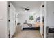 Bright bedroom featuring a ceiling fan and ample natural light and calming decor at 14867 E Pacific Pl, Aurora, CO 80014