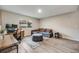 Inviting office/living space with a comfortable seating, desk, and natural light at 14867 E Pacific Pl, Aurora, CO 80014