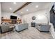 Inviting living room with a brick fireplace, stylish decor, and ample seating at 14867 E Pacific Pl, Aurora, CO 80014