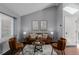 Cozy living room featuring stylish decor, wood floors and comfortable seating at 19454 E Florida Pl, Aurora, CO 80017