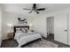 Cozy main bedroom with plush bedding, contemporary decor, and plenty of natural light at 19454 E Florida Pl, Aurora, CO 80017