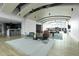 Spacious community room with a modern design, lounge area, and large windows for natural light at 1700 Bassett St # 1301, Denver, CO 80202