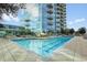 Luxury apartment complex swimming pool with city views and lounge seating at 1700 Bassett St # 1301, Denver, CO 80202