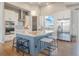 Modern kitchen featuring granite countertops, stainless steel appliances, a spacious island, and stylish pendant lighting at 670 Portland Rd, Monument, CO 80132