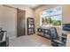 The office has great views, a sliding barn door, and is carpeted at 670 Portland Rd, Monument, CO 80132