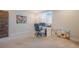 Bright home office with a window, desk, and artwork, ideal for remote work at 670 Portland Rd, Monument, CO 80132