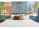 Comfortable bedroom with a large bed, stylish decor, natural light, and calm ambiance at 5428 Zephyr Ct, Arvada, CO 80002