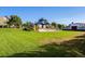 Picturesque park setting with manicured lawns and an inviting gazebo for community enjoyment at 5428 Zephyr Ct, Arvada, CO 80002