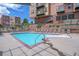 Inviting community pool with lounge chairs and easy access for a refreshing swim at 5428 Zephyr Ct, Arvada, CO 80002