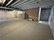 Unfinished basement with exposed ceiling and a framed wall, ready for customization at 2141 S Irvington St, Aurora, CO 80018