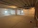 Spacious unfinished basement with exposed ceiling, insulated walls, and potential for customization at 2141 S Irvington St, Aurora, CO 80018