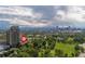 Stunning aerial view of the property, showing the city skyline and green surroundings at 2950 E 17Th Ave, Denver, CO 80206
