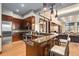 Modern kitchen with stainless steel appliances, granite counters and breakfast bar with seating at 2950 E 17Th Ave, Denver, CO 80206