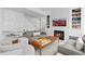 Bright living room featuring a fireplace, hardwood floors and chic decor at 2950 E 17Th Ave, Denver, CO 80206