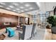 Spacious lounge area with a fireplace, comfortable seating, and plenty of natural light at 2950 E 17Th Ave, Denver, CO 80206