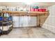 An organized two-car garage with overhead storage and shelving units at 3893 Ute Mountain Trl, Castle Rock, CO 80109