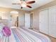A main bedroom features a doorway to the main bathroom, a closet, and carpeted floors at 3893 Ute Mountain Trl, Castle Rock, CO 80109