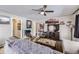 Comfortable living room showcasing a modern ceiling fan and stylish decor at 1700 W Stoll Pl, Denver, CO 80221