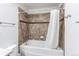 This bathroom has a shower with a tub and tile surround at 2200 S University Blvd # 212, Denver, CO 80210