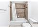 Bright bathroom featuring a tiled shower-tub combination and modern fixtures at 2200 S University Blvd # 212, Denver, CO 80210