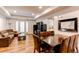 Open floor plan features a comfortable living room, dining area, and access to a private patio at 2200 S University Blvd # 212, Denver, CO 80210