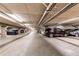 Well-lit parking garage with ample space for parking at 2200 S University Blvd # 212, Denver, CO 80210