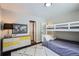 Bright bedroom featuring a stylish dresser, colorful map, and a cozy bunk bed with a plush rug at 27732 Squaw Pass Rd, Evergreen, CO 80439