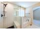 Beautiful bathroom features a glass enclosed walk-in shower and soaking tub at 25871 E 5Th Pl, Aurora, CO 80018