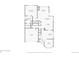 Detailed floor plan of the home's first floor, highlighting kitchen, living spaces, and garage at 25871 E 5Th Pl, Aurora, CO 80018