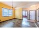 Open-concept living room with hardwood floors, and stairs to the 2nd story at 25871 E 5Th Pl, Aurora, CO 80018