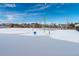 Community water park equipment is covered in snow with blue skies in the background at 25871 E 5Th Pl, Aurora, CO 80018