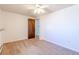 Bedroom with neutral carpet, a ceiling fan, and natural light from the window at 2700 S Holly St # 115, Denver, CO 80222