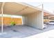Well-maintained carport providing covered parking and storage space at 2700 S Holly St # 115, Denver, CO 80222