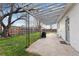 Spacious backyard features a covered patio with string lights, perfect for outdoor relaxation at 5123 Milwaukee St, Denver, CO 80216