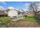 Backyard featuring a lawn and partially covered patio at 5123 Milwaukee St, Denver, CO 80216