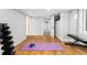 Basement gym with hard wood floors and weight training equipment at 5123 Milwaukee St, Denver, CO 80216