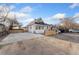 Charming home featuring a well-maintained exterior and private parking area at 5123 Milwaukee St, Denver, CO 80216