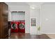 Convenient laundry room featuring modern appliances and ample storage space at 5123 Milwaukee St, Denver, CO 80216