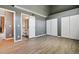 Open bedroom with ensuite bathroom, fireplace and ample closet space at 19192 E Wyoming Pl # 206, Aurora, CO 80017