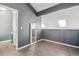 Bedroom with lofted ceilings and wood-style flooring at 19192 E Wyoming Pl # 206, Aurora, CO 80017
