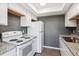 Kitchen featuring modern appliances and a neutral color palette at 19192 E Wyoming Pl # 206, Aurora, CO 80017
