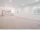 Finished basement with large open space and wet bar at 3826 N Elk St, Aurora, CO 80019