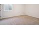 Bright and airy basement bedroom with neutral carpeting at 3826 N Elk St, Aurora, CO 80019
