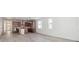 Open concept kitchen features island, stainless steel appliances, and light wood cabinets at 3826 N Elk St, Aurora, CO 80019